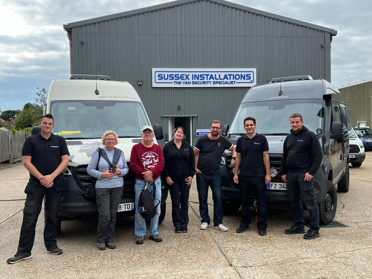 Customers from France with two 4WD Mercedes Sprinter motorhomes at Sussex Installations in Eastbourne