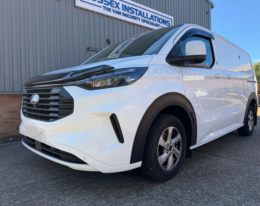 Ford Custom 2024-on in Frozen White at Sussex Installations, fitted with colour-coded external shields