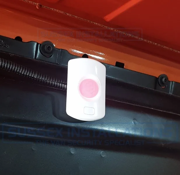 A hard-wired PIR detector for the load area of a van