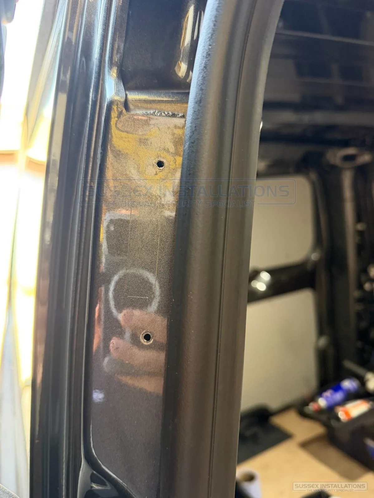 Marked van door edge before cutting and fitting the keep