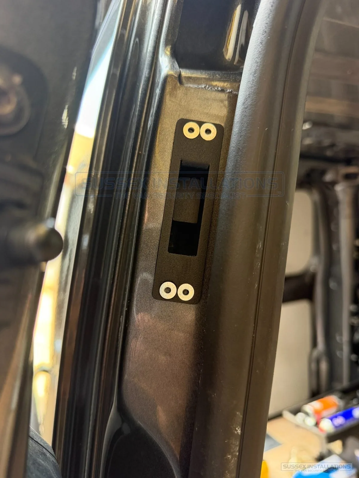 Prepared rear van door keep aperture before final fitting