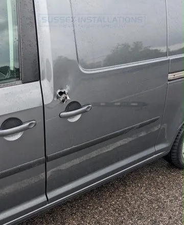 An older shape VW Caddy side door break in