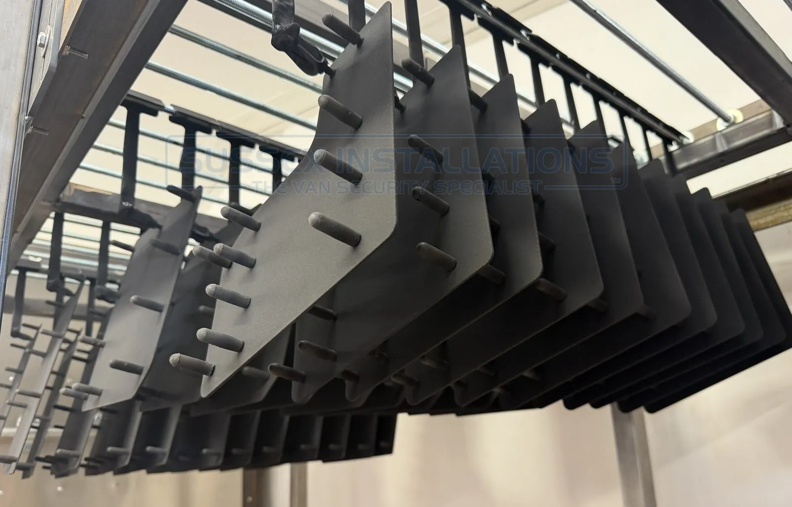 The compact powder-coating facility designed and built by Sussex Installations